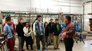 Students from Bowsher High School tour the Piping Industry Training Center.